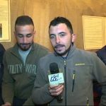 Processione notturna della Naca a Davoli con abeti illuminati dai lampioncini